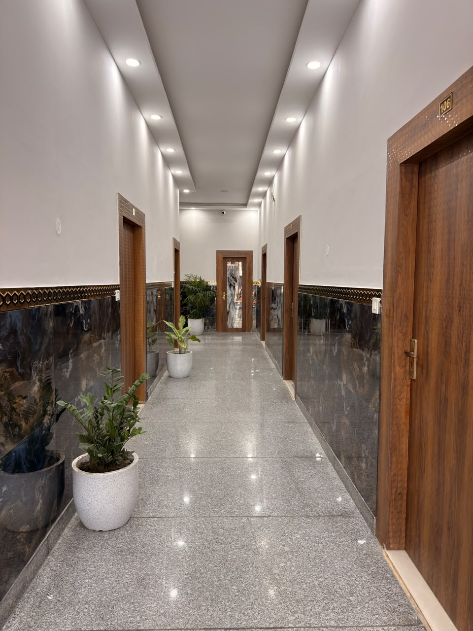 Interior corridor at Vedic Portico Hotel