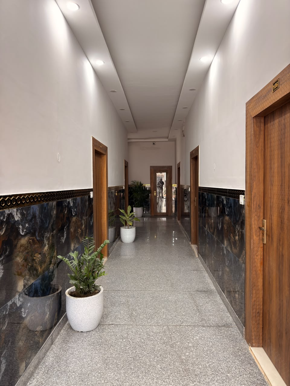 Interior corridor at Vedic Portico Hotel