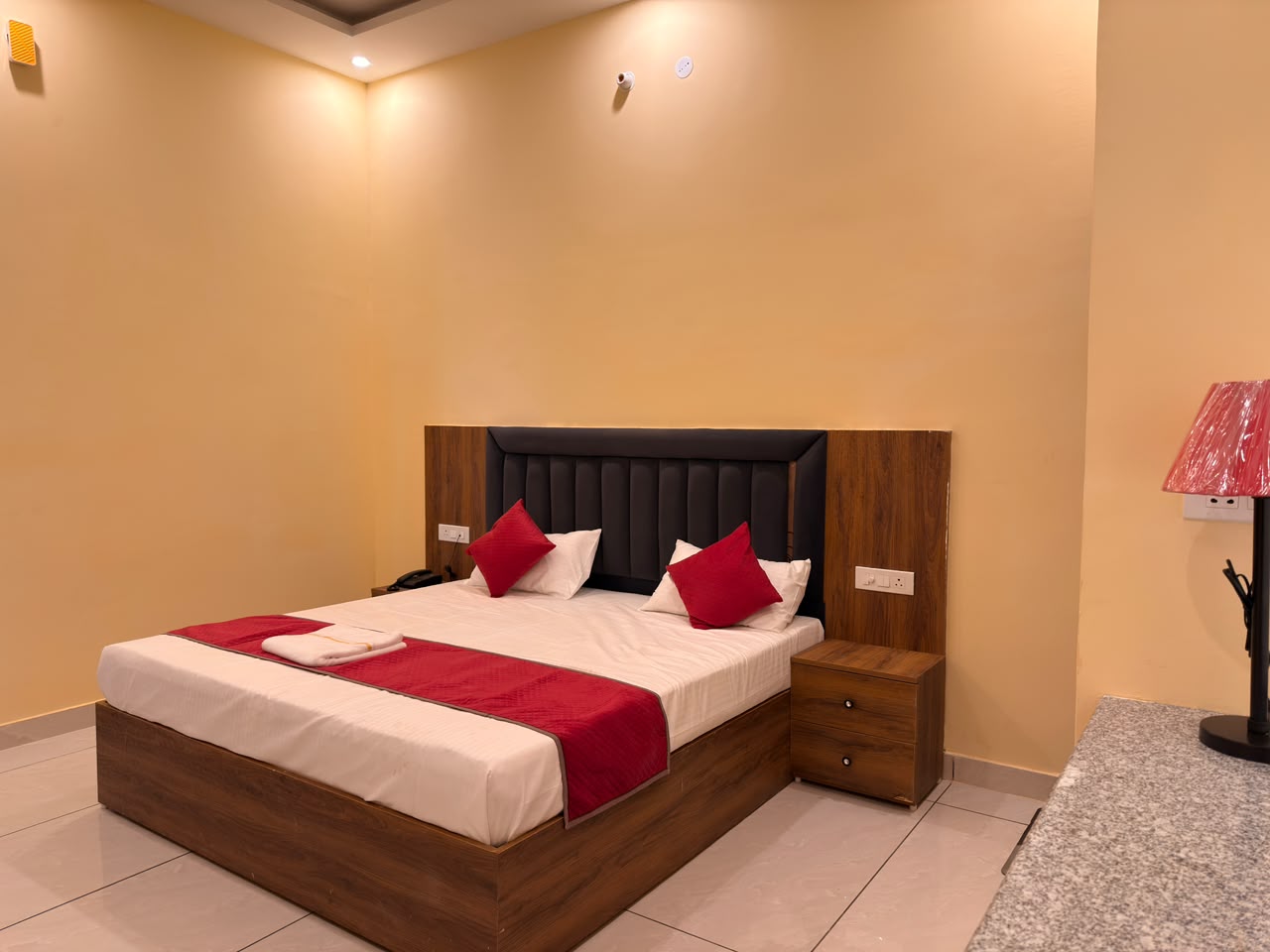 Compact guest room at Vedic Portico Hotel