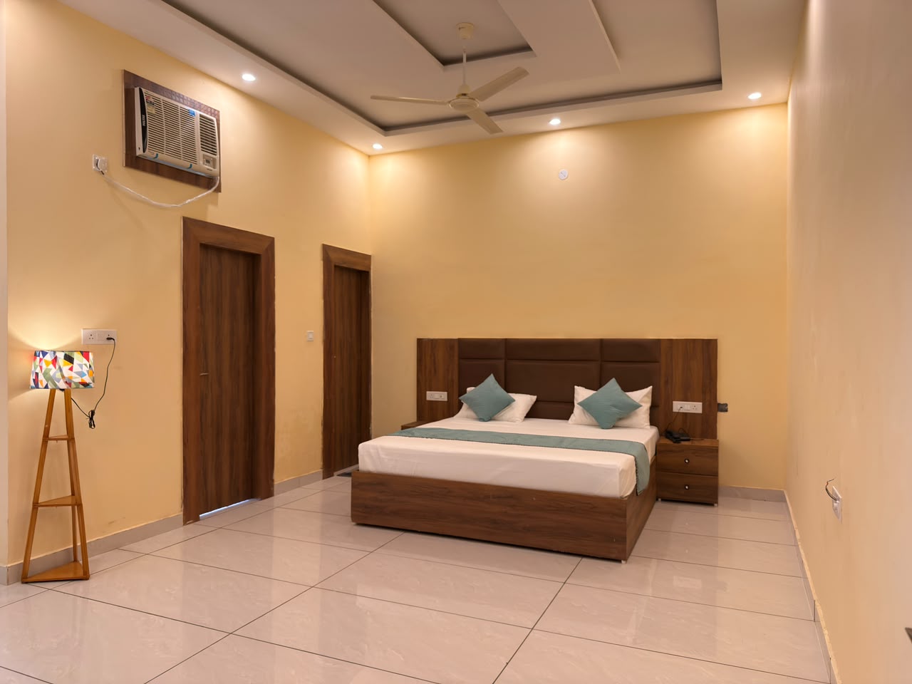 Spacious guest room at Vedic Portico Hotel